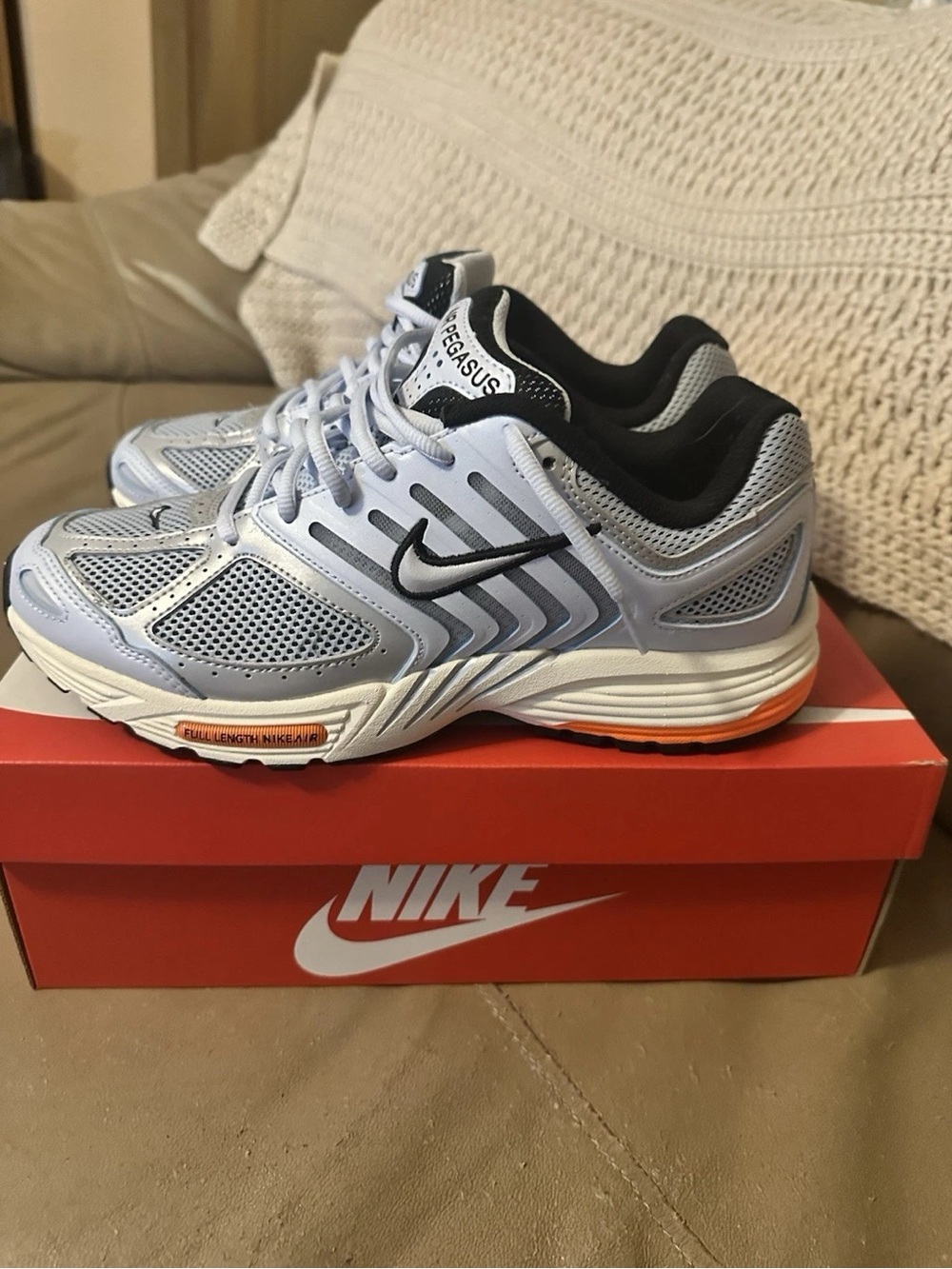 Nike Men's Running Shoes in Light Blue with Black and Orange Accents
